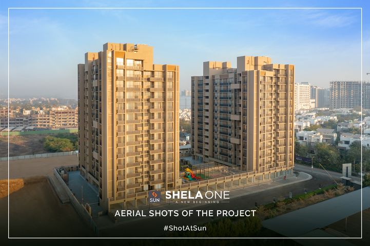 Sharing the Aerial Shots of Our Recently Completed Project, Sun ShelaOne. This Project is decked up with 2 and 2.5 BHK apartment units that are designed ingeniously to offer the unobstructive panoramic views.

Sun ShelaOne speaks about the quality living space solutions we create, the most efficient facilities for our members, from the conception of a project through construction, operations and maintenance.

Location: Shela
Status: Delivered Project
Architect: @hm.architects
Photography: @panjwani.vinay 

#SunBuildersGroup #SunBuilders #ShotAtSun #SunShelaOne #AffordableHomes #CompletedProject #Home #2BHK #Residential #Shela #BuildingCommunities #RealEstateAhmedabad