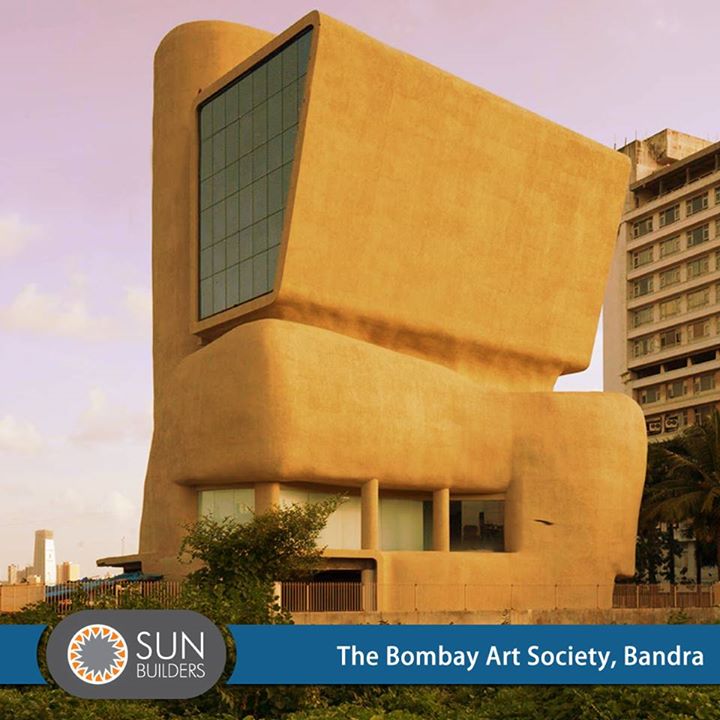 With its rolling concrete skin, overhanging cubist blocks and three-storey high glass panels, the Bombay Art Society’s new building designed by Sanjay Puri architects, at Bandra Reclamation looks like no other in Mumbai. #landmark #artgallery #architecture