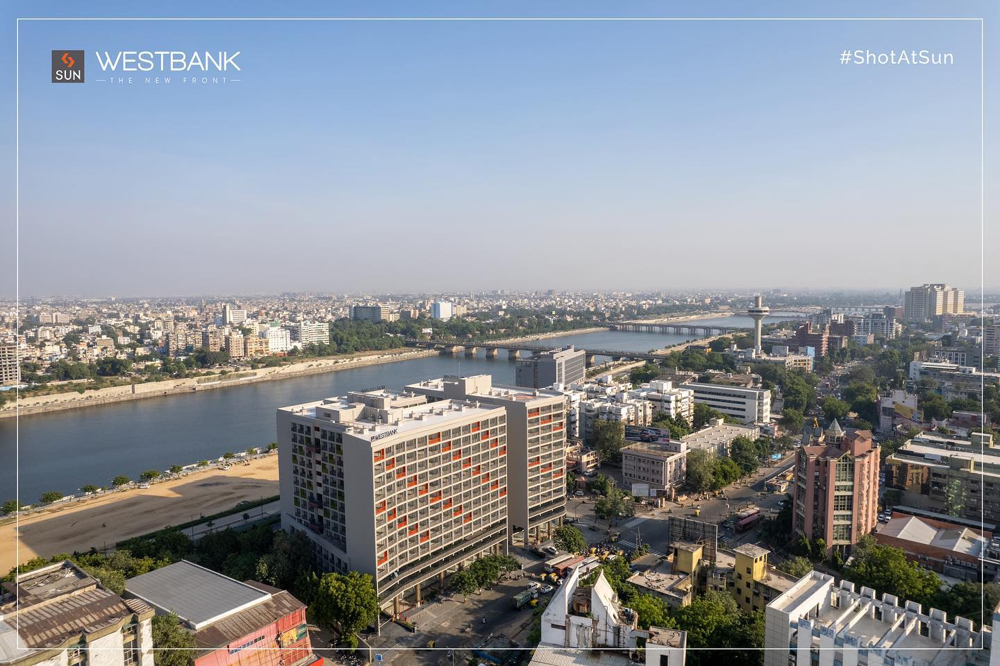 Sun Builders,  SunBuildersGroup, SunBuilders, SunWestBank, ShotAtSun, Commercial, Offices, Retail, AshramRoad, droneshots, aerial, aerialview, RiverFront, PossessionReady, BuildingCommunities, SmartInvestment, RealEstateAhmedabad, helloahmedabad