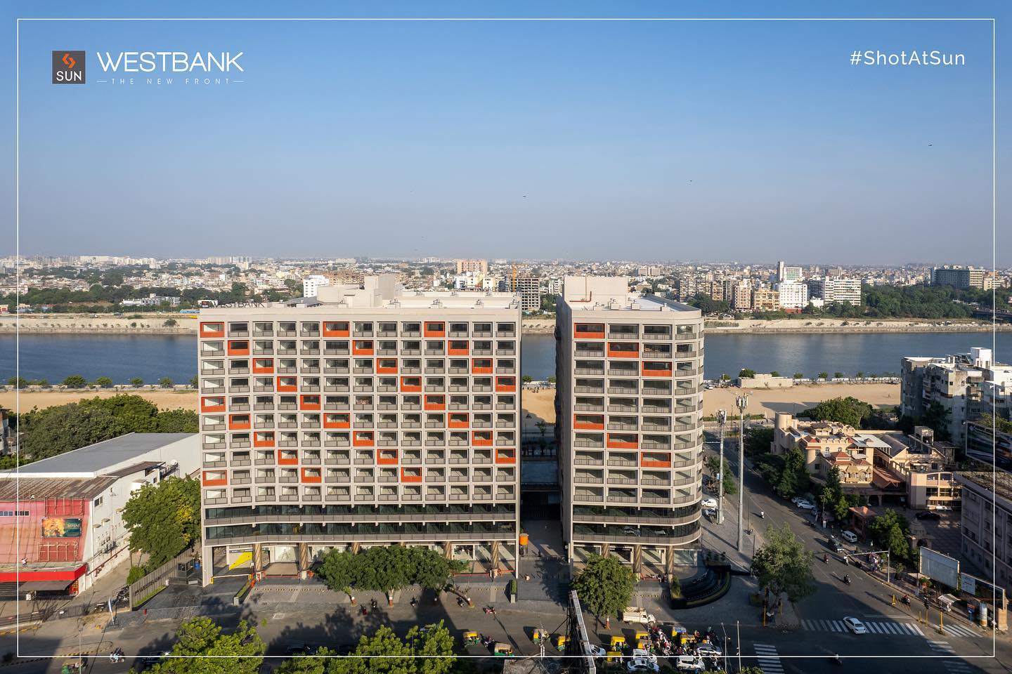 Sun Builders,  SunBuildersGroup, SunBuilders, SunWestBank, ShotAtSun, Commercial, Offices, Retail, AshramRoad, droneshots, aerial, aerialview, RiverFront, PossessionReady, BuildingCommunities, SmartInvestment, RealEstateAhmedabad, helloahmedabad