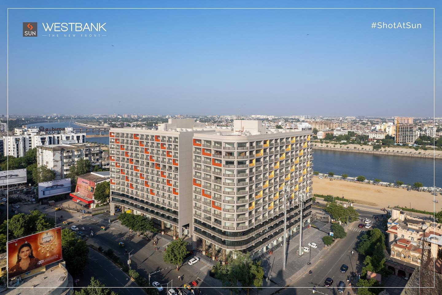 Sun Builders,  SunBuildersGroup, SunBuilders, SunWestBank, ShotAtSun, Commercial, Offices, Retail, AshramRoad, droneshots, aerial, aerialview, RiverFront, PossessionReady, BuildingCommunities, SmartInvestment, RealEstateAhmedabad, helloahmedabad