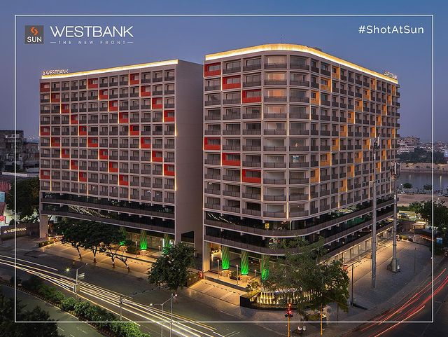 Sharing The Glimpses of our milestone project Sun WestBank which is one of the newest development; Ashram Road has witnessed in this decade. Strategically located at the prime junction at Vallabhsadan, this talk-of-the -town business hub is an absolute visual treat and architectural marvel. 
 
Proudly wearing crown of visibility, this Iconic Project is spread over 7 Lac Sq. Ft. of corporate spaces and has already become the new front to the Riverfront! 

Be a part of the corporate environment that will elevate your everyday life with facades of astonishment.

For Details Call: +91 9978932057

Location: Ashram Road, River Front
Status: Possession Ready
Architect: @hm.architects
Lighting Consultant : @pranav_ziondzine 
Construction partner: @hitech_pvt_ltd 
Photography: @umangshahphotography
@patel_narendra_nk @harshikapatel_ 

#SunBuildersGroup #SunBuilders #SunWestBank #ShotAtSun #Commercial #Offices #Retail #AshramRoad #RiverFront #PossessionReady #BuildingCommunities #SmartInvestment #RealEstateAhmedabad #helloahmedabad