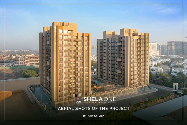 Sharing the Aerial Shots of Our Recently Completed Project, Sun ShelaOne. This Project is decked up with 2 and 2.5 BHK apartment units that are designed ingeniously to offer the unobstructive panoramic views.

Sun ShelaOne speaks about the quality living space solutions we create, the most efficient facilities for our members, from the conception of a project through construction, operations and maintenance.

Location: Shela
Status: Delivered Project
Architect: @hm.architects
Photography: @panjwani.vinay 

#SunBuildersGroup #SunBuilders #ShotAtSun #SunShelaOne #AffordableHomes #CompletedProject #Home #2BHK #Residential #Shela #BuildingCommunities #RealEstateAhmedabad